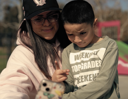 Stephanie Reyes and her son taking a selfie.