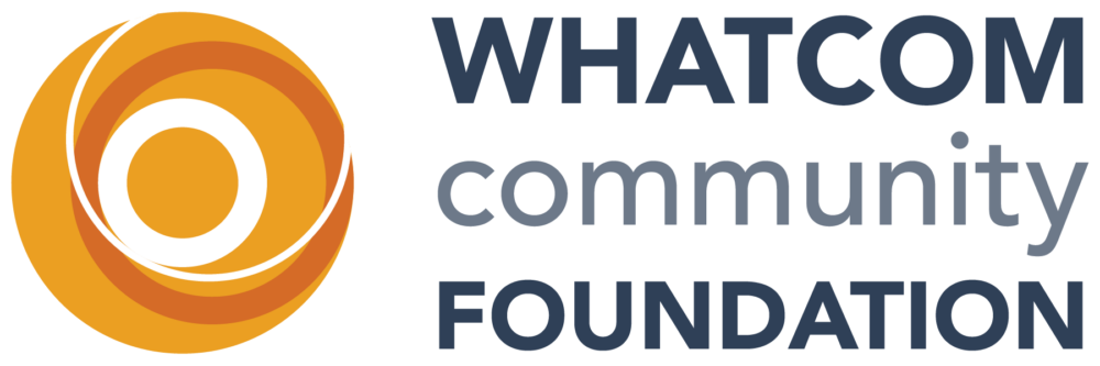 Whatcom Community Foundation logo with an abstract orange circular design on the left and the organization name in bold and regular fonts on the right.